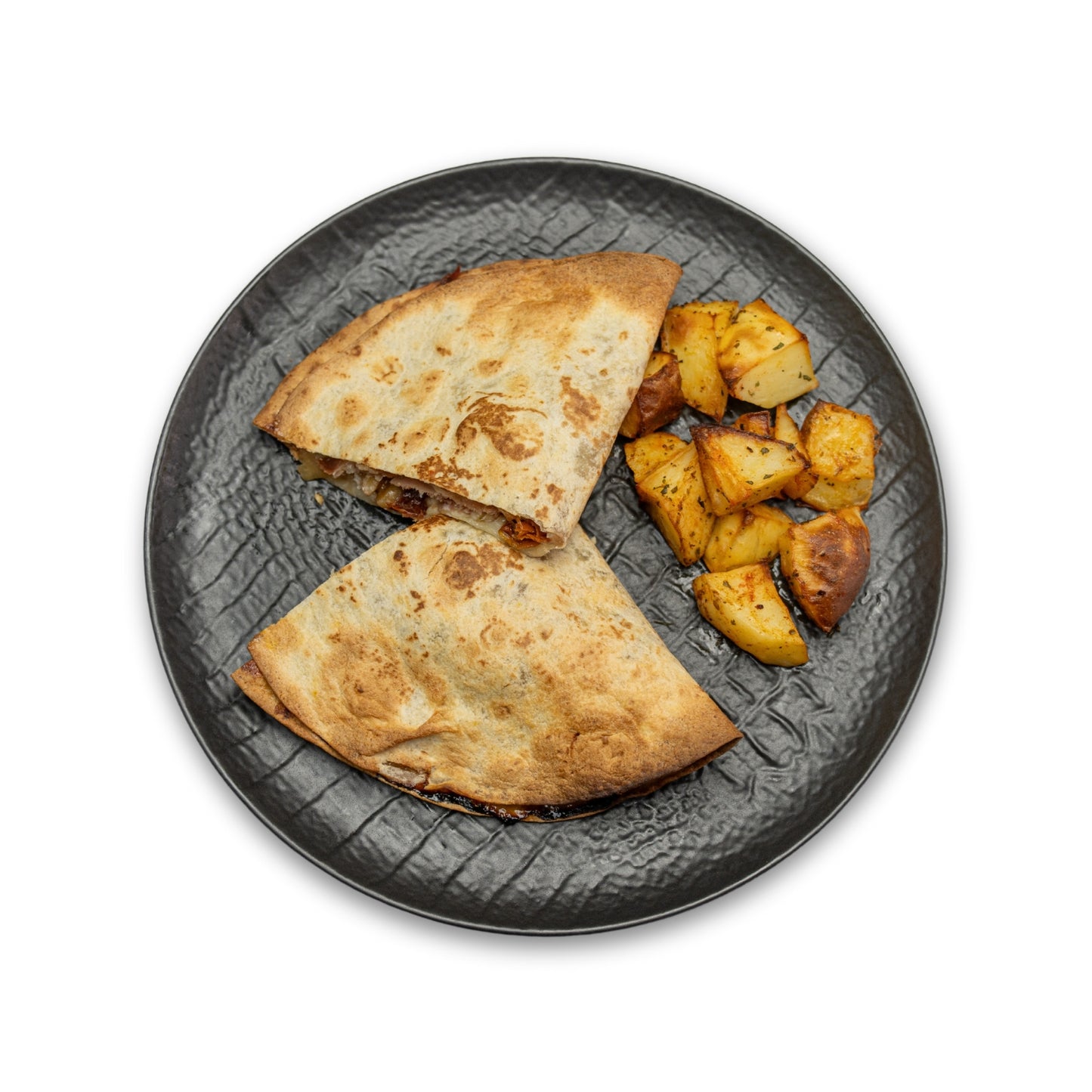 Piadina de jamón, con gorgonzola, cebolla caramelizada, nueces y tomate seco