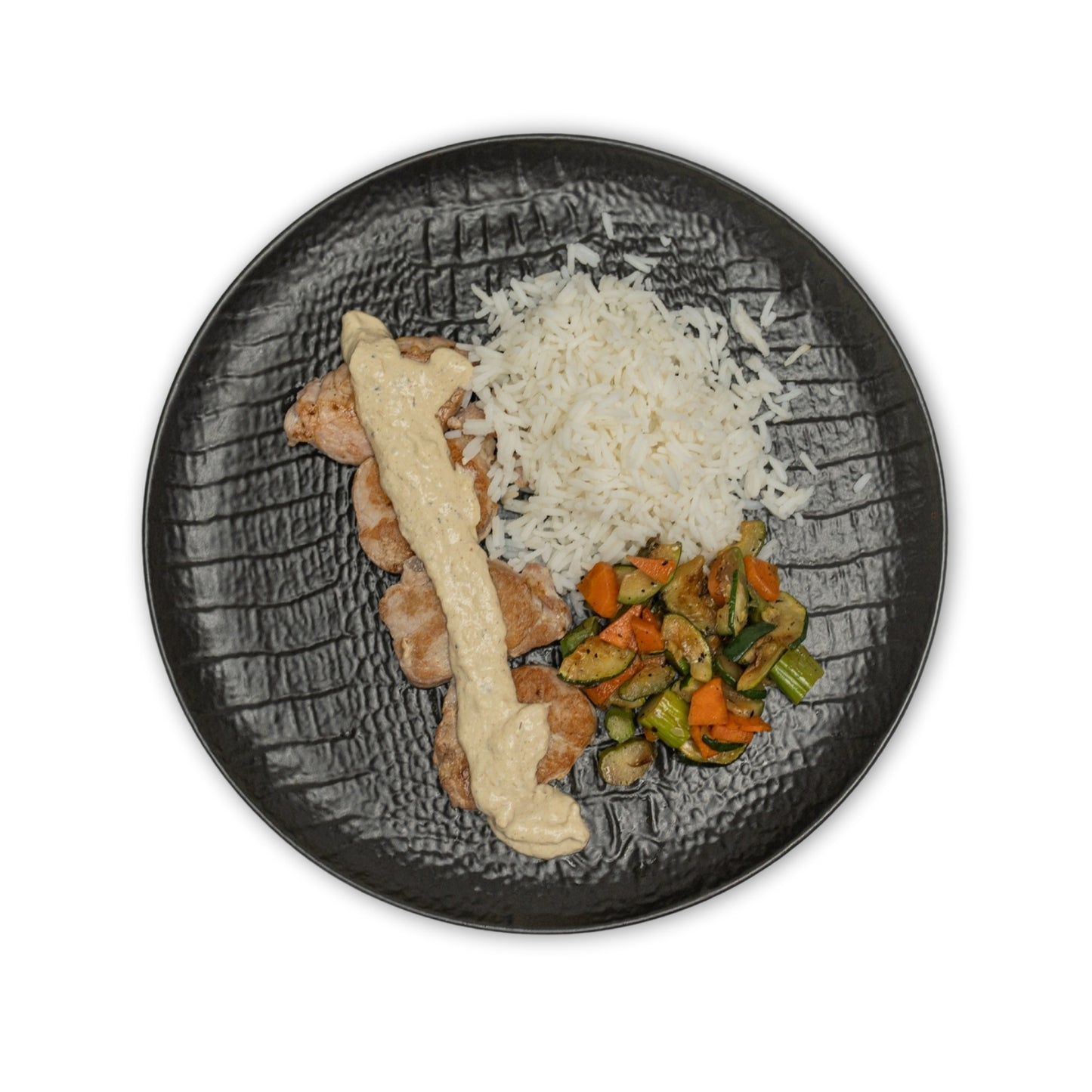 Solomillo de cerdo con salsa a la pimienta arroz basmati y salteado de trigueros