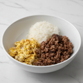 Ternera picada con huevos revueltos y arroz basmati Alérgenos: Huevo