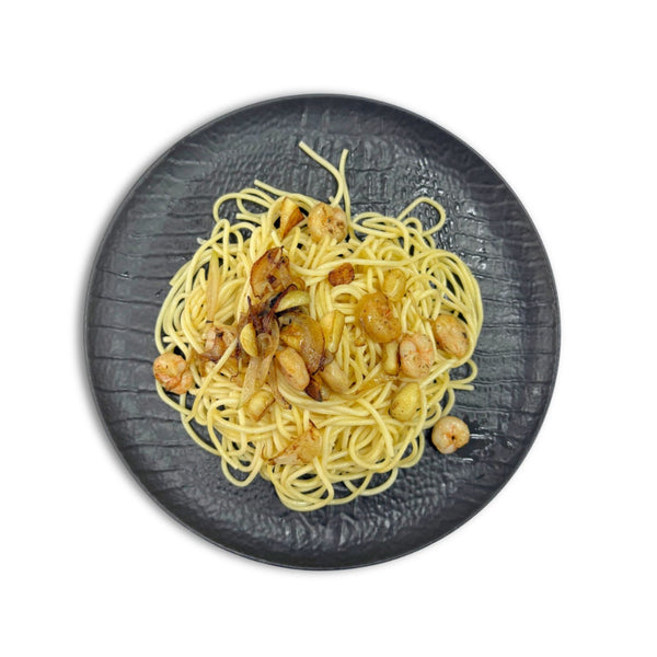 Espaguetis con gambas y ajos tiernos