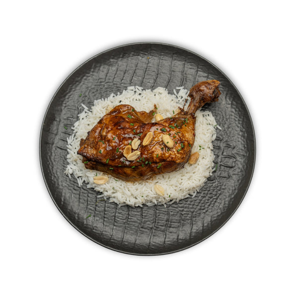Muslos de pollo macerados en cítricos con arroz basmat