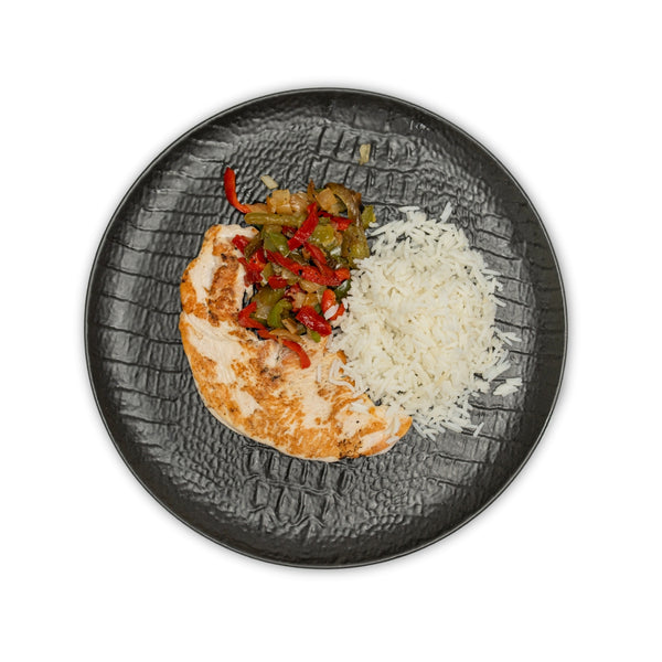 Pechuga de pavo al horno con arroz basmati y salteado manduca