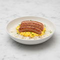 Salchichas de pollo con arroz basmati y 2 huevos revueltos