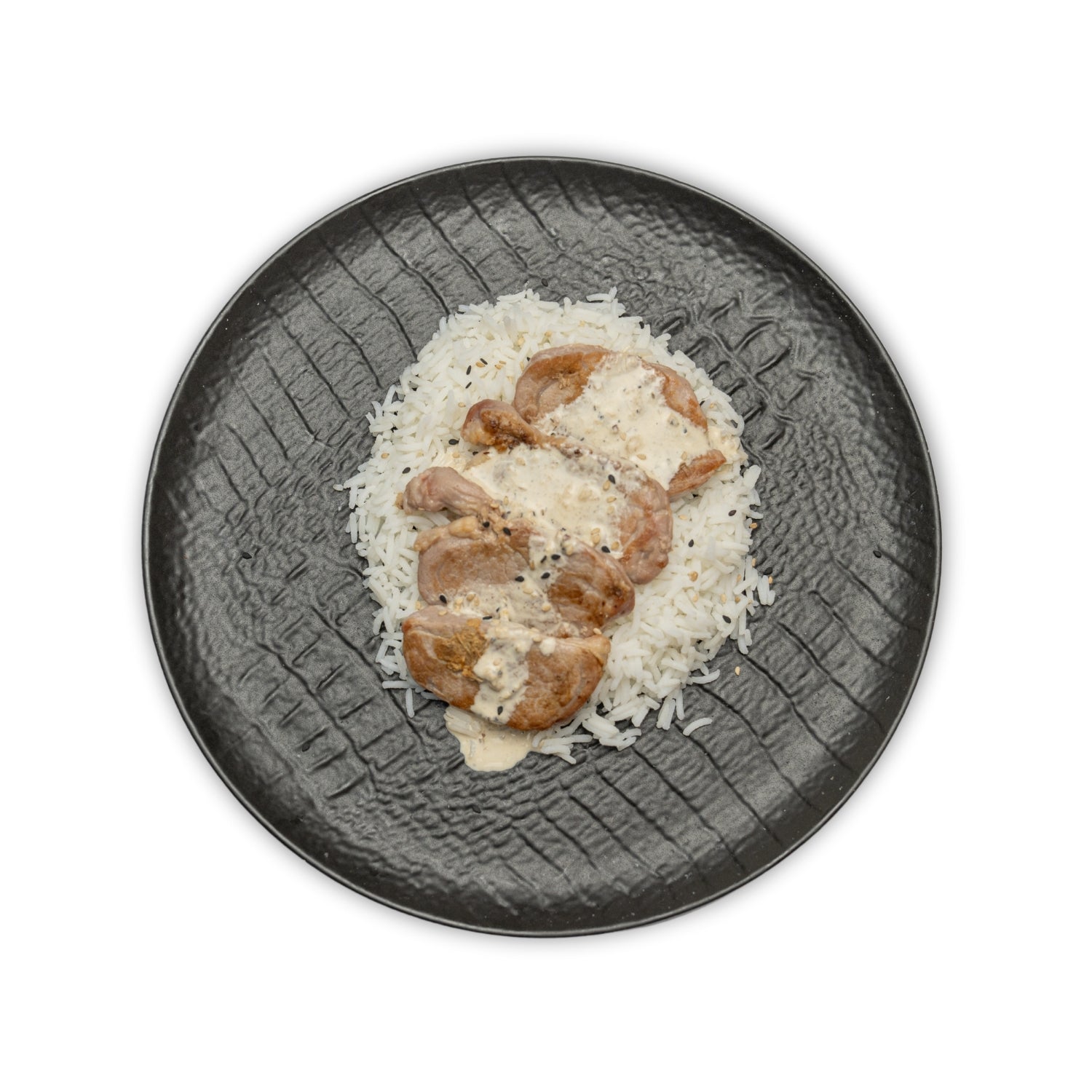 Solomillo de cerdo ibérico con salsa a la pimienta y arroz basmati